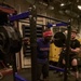 US Navy Sailors Participate in a Squat Challenge Aboard USS George H.W. Bush