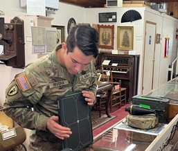 Explosive Ordnance Disposal Soldiers protect museum visitors from potential danger