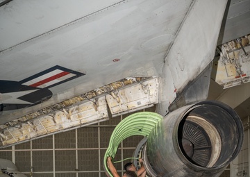 Aircraft maintainers work on E-8C Joint STARS engine