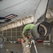 Aircraft maintainers work on E-8C Joint STARS engine