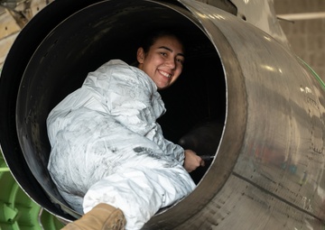 Aircraft maintainers work on E-8C Joint STARS engine