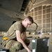 Aircraft maintainers work on E-8C Joint STARS engine