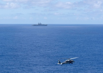 In Close Orbit:  Helicopter Sea Combat Squadron (HSC) 23   Aboard USS Tripoli (LHA 7)