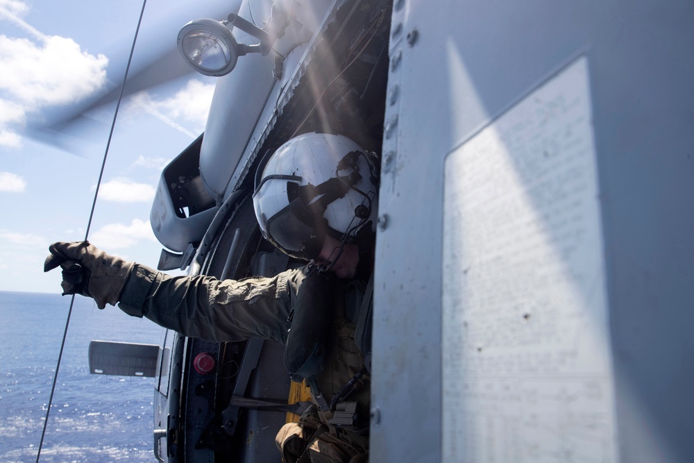 HSC-23 Flies SAR Training from USS Tripoli (LHA 7)