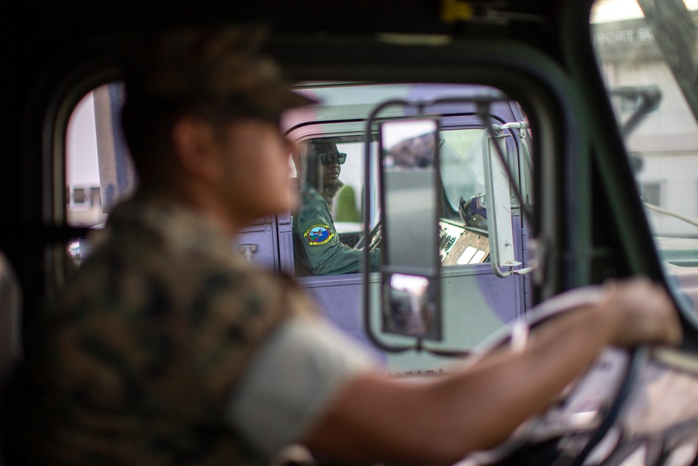 Marines with MWSS-171 refuel P-8A Poseidon