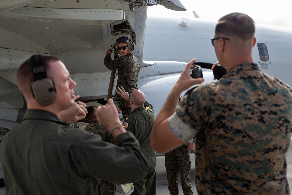 Marines with MWSS-171 refuel P-8A Poseidon