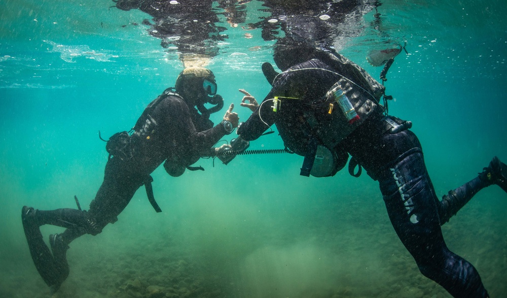 Naval Special Warfare Divers train at altitude