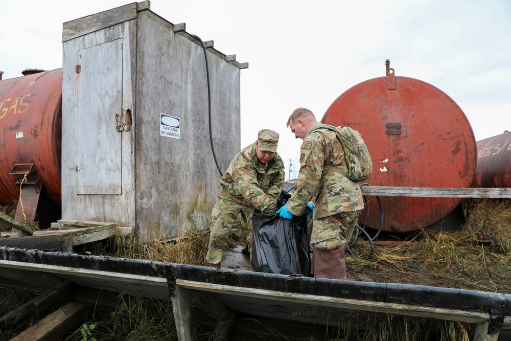 Alaska National Guardsmen in Joint Task Force-Bethel clear storm debris in Newtok, Alaska