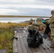 Alaska National Guardsmen in Joint Task Force-Bethel clear storm debris in Newtok, Alaska