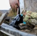 Alaska National Guardsmen in Joint Task Force-Bethel clear storm debris in Newtok, Alaska