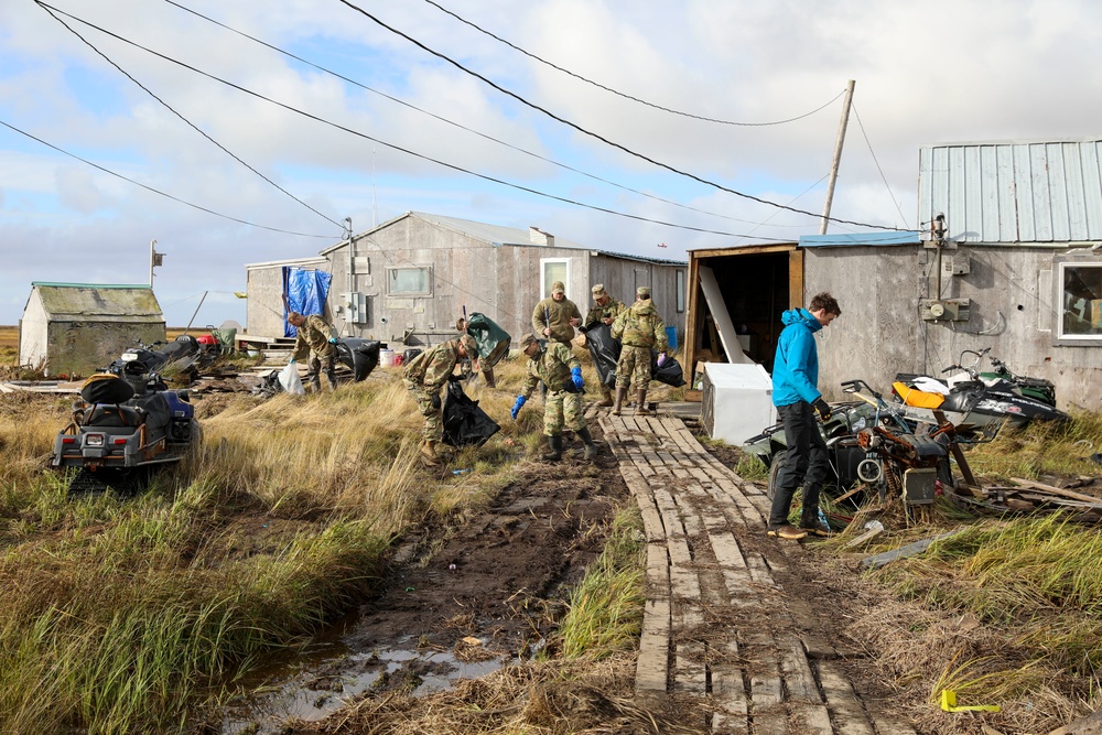 Alaska National Guardsmen in Joint Task Force-Bethel clear storm debris in Newtok, Alaska