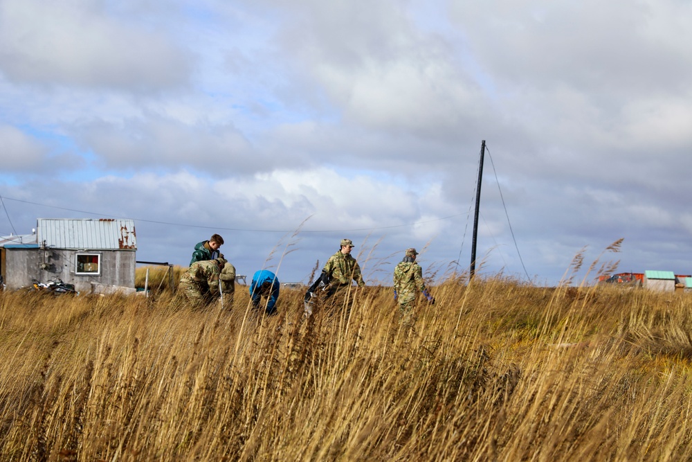 Alaska National Guardsmen in Joint Task Force-Bethel clear storm debris in Newtok, Alaska