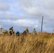 Alaska National Guardsmen in Joint Task Force-Bethel clear storm debris in Newtok, Alaska