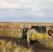 Alaska National Guardsmen in Joint Task Force-Bethel clear storm debris in Newtok, Alaska