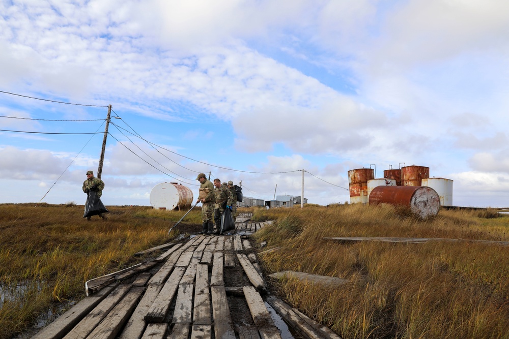 Alaska National Guardsmen in Joint Task Force-Bethel clear storm debris in Newtok, Alaska