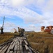 Alaska National Guardsmen in Joint Task Force-Bethel clear storm debris in Newtok, Alaska