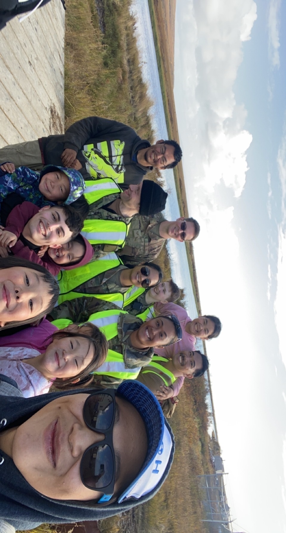 Service members of Joint Task Force-Bethel clear storm debris in Nightmute, Alaska for Operation Merbok Response