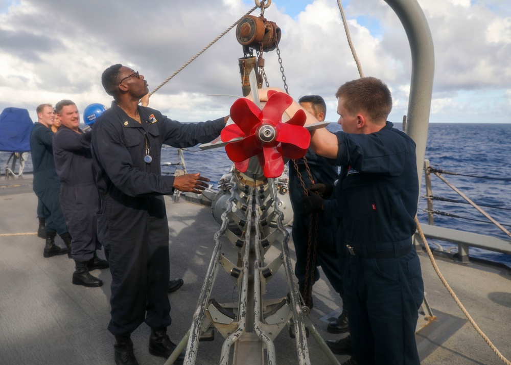 Sailors Load Torpedo