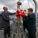 Sailors Load Torpedo