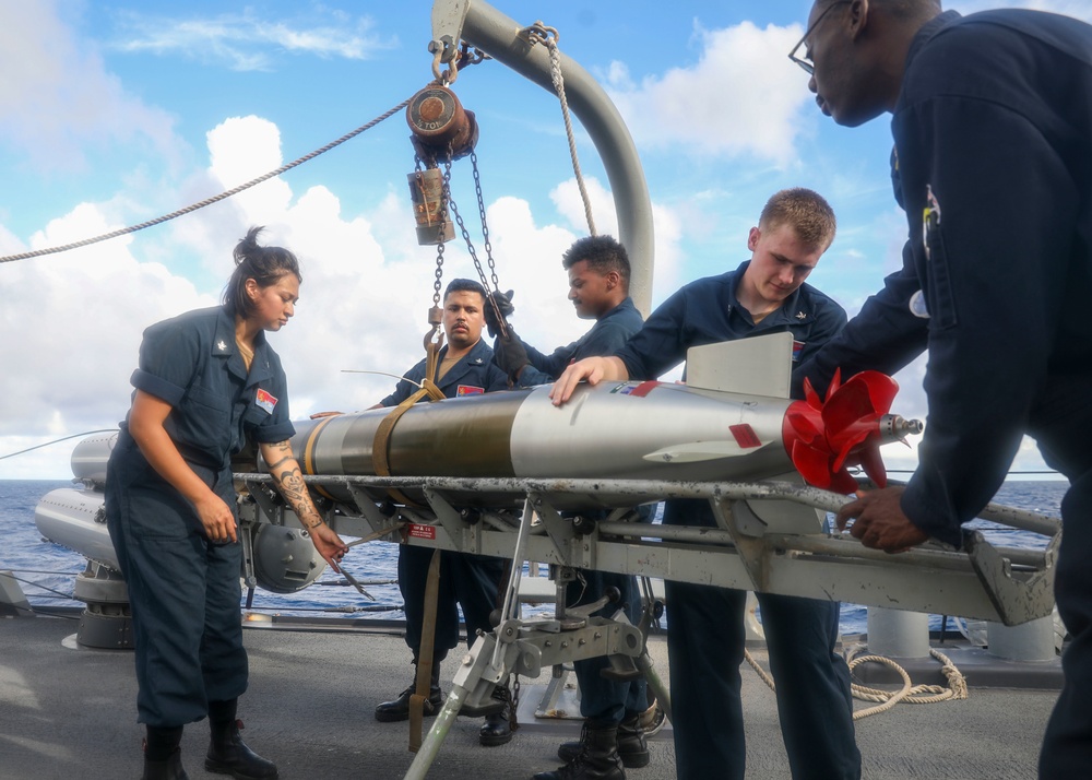 Sailors Load Torpedo