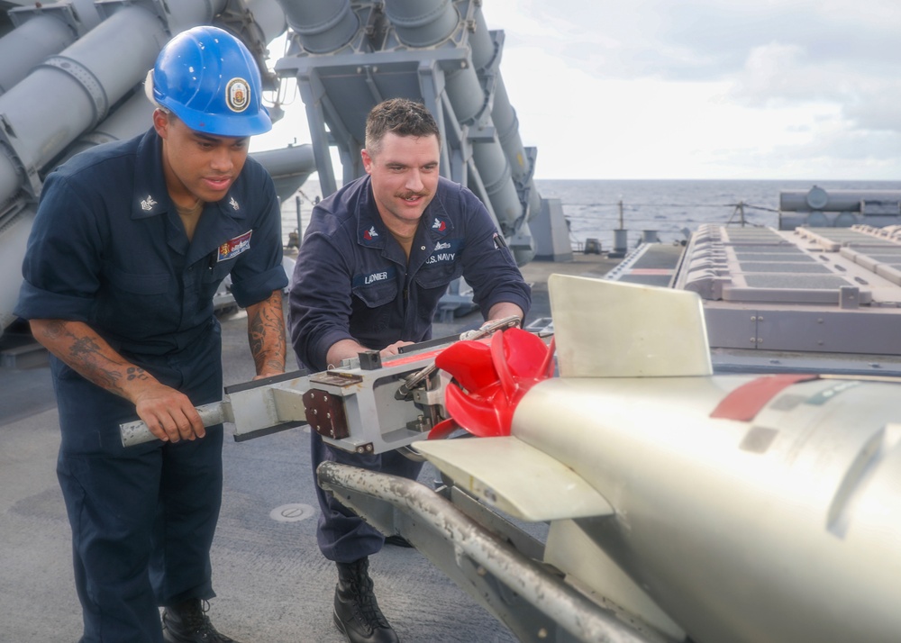 Sailors Load Torpedo