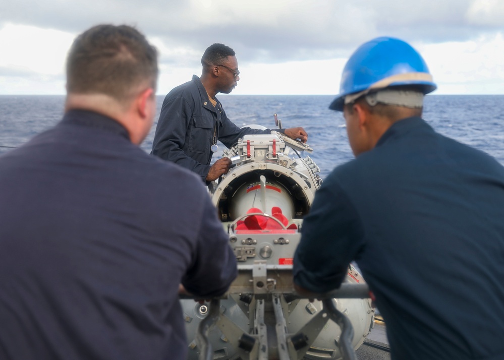 Sailors Load Torpedo