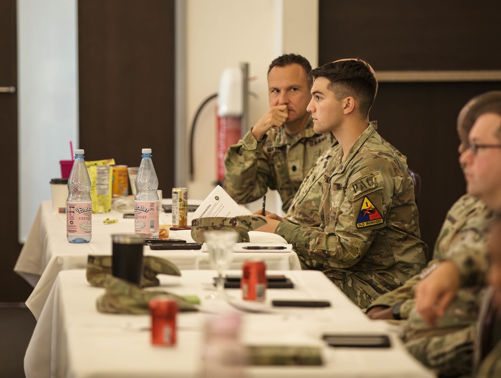 Spc. William Thompson Taking Notes during Keynote Speakers