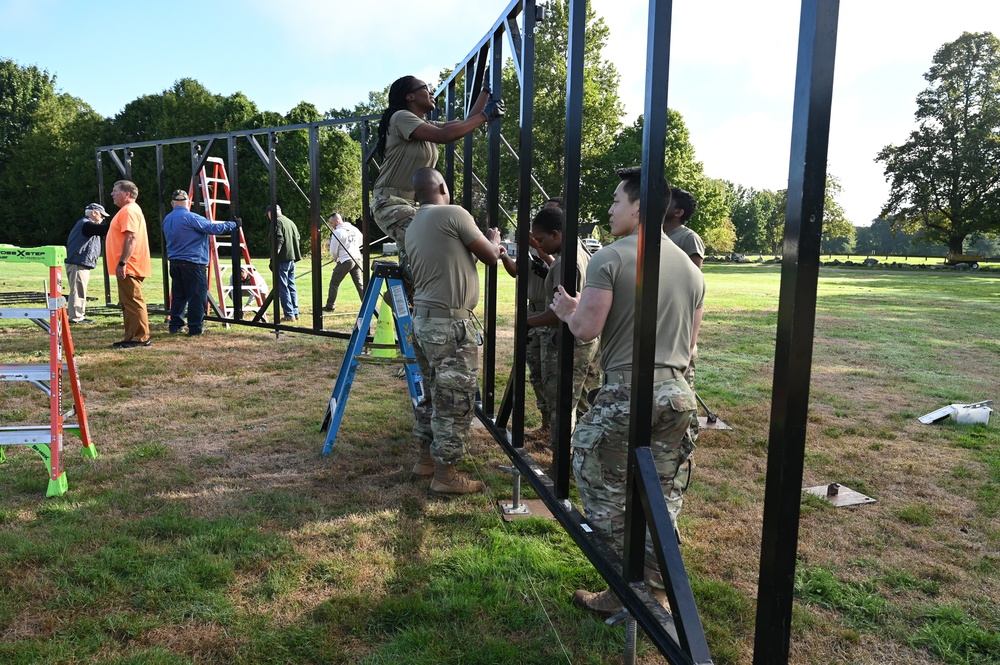Hanscom volunteers help assemble Wall That Heals