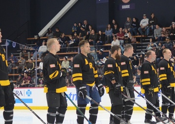 Navy sinks Army on ice in overtime