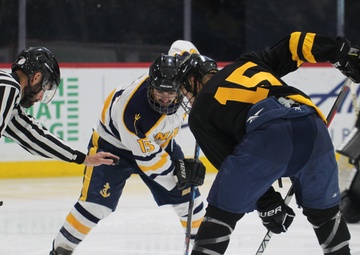 Navy sinks Army on ice in overtime