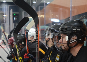 Navy sinks Army on ice in overtime