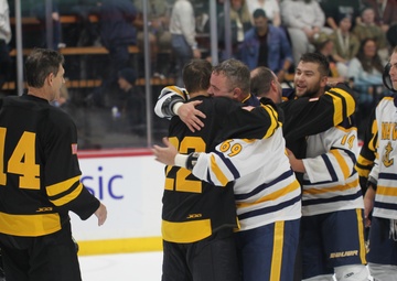 Navy sinks Army on ice in overtime