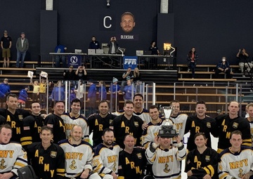 Navy sinks Army on ice in overtime