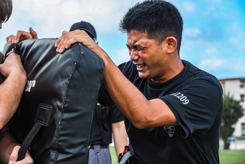 Japanese Security Guards train with OC spray