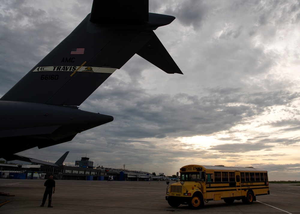 349th Air Mobility Wing delivers buses to Haiti