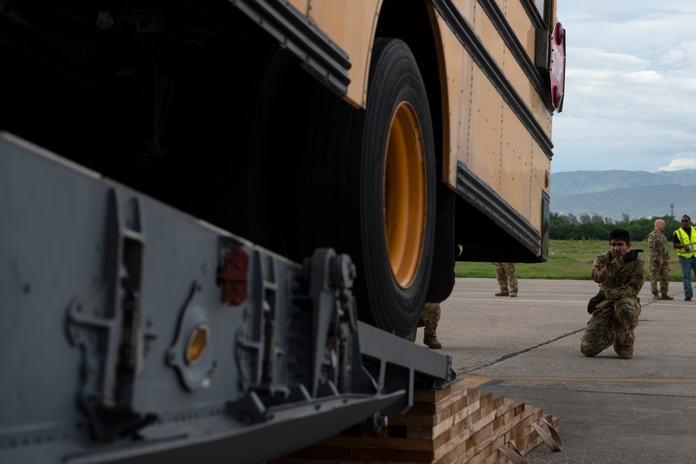 349th Air Mobility Wing delivers buses to Haiti