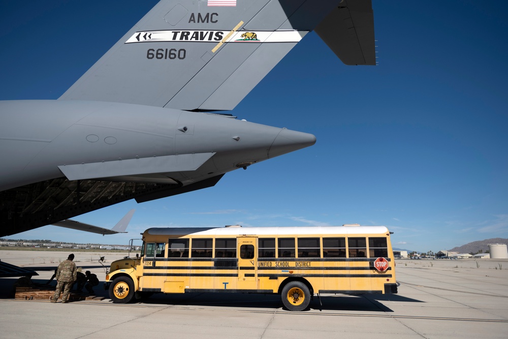 349th Air Mobility Wing delivers buses to Haiti