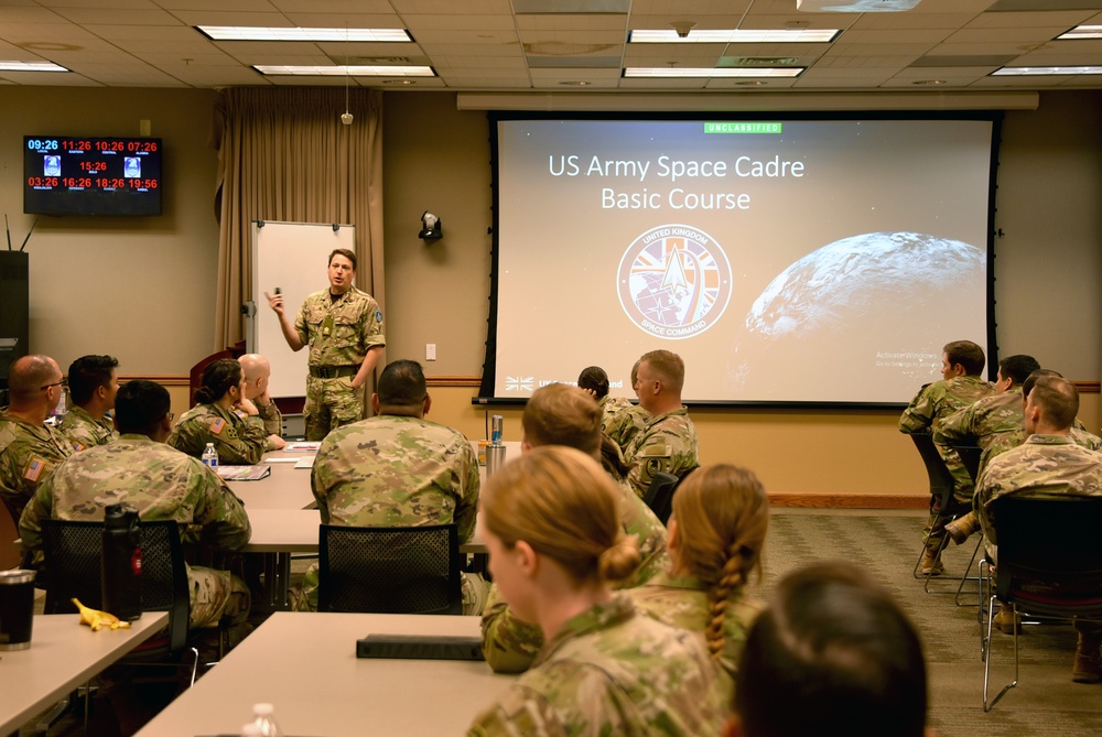 Maj. Paul Wooster speaks to ASCBC students