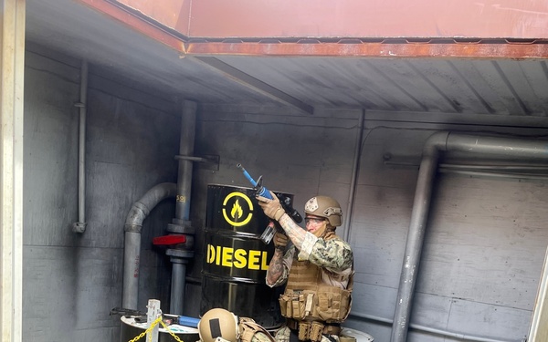 Maritime Expeditionary Security Group (MESG) 1 Training Evaluation Unit trains Sailors and Marines assigned to Maritime Expeditionary Security Group (MESG) 1 Detachment Guam during Close Quarter Tactics (CQT)