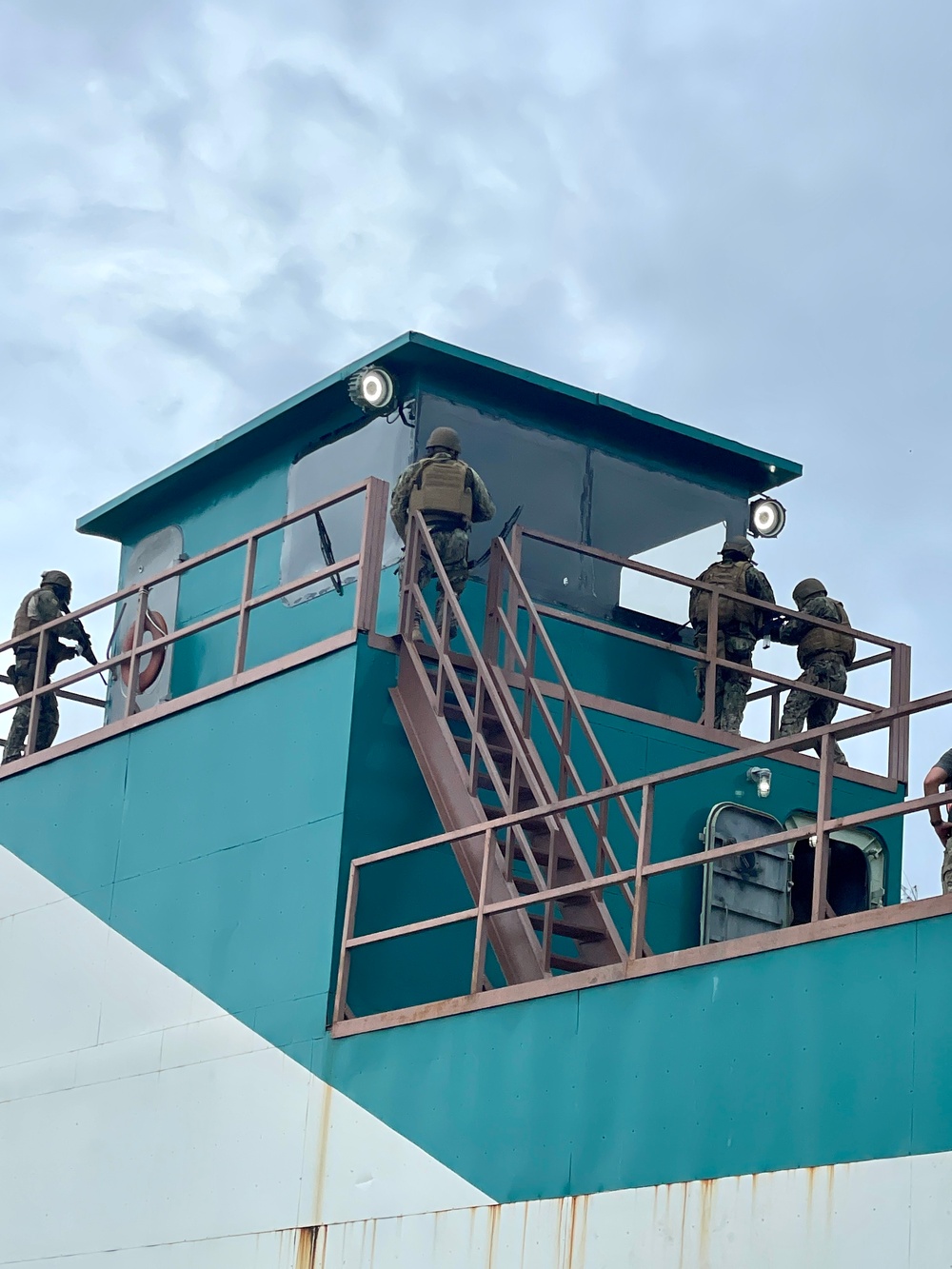 Maritime Expeditionary Security Group (MESG) 1 Training Evaluation Unit trains Sailors and Marines assigned to Maritime Expeditionary Security Group (MESG) 1 Detachment Guam during Close Quarter Tactics (CQT)