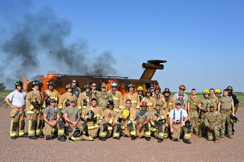 507th CES reservists, 97th CES Airmen, partner for fire training