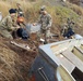 Service members in Joint Task Force - Bethel assist the community of Chevak, Alaska in storm recovery efforts for Operation Merbok Response