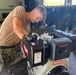 NMCB-11 Seabees Install Crate Motor on a Globe Trailer