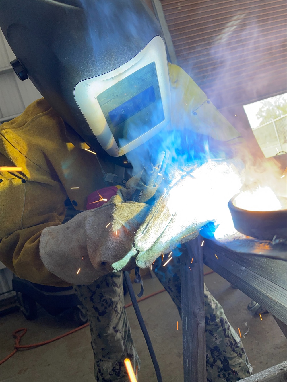 NMCB-11 Seabees repair welds on bollard covers in support of EODMU-5