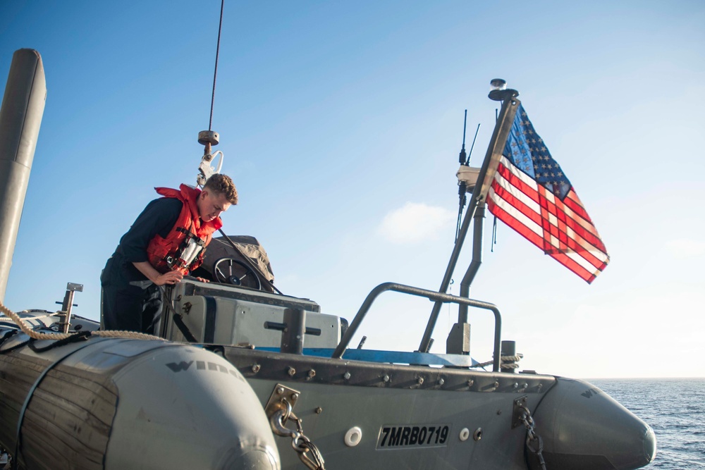 U.S. Sailor Prepares A RHIB For Operations