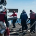 U.S. Sailors Refuel An MH-60R Sea Hawk Helicopter