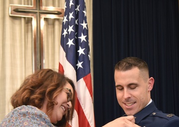 From maintainer stripes to captain bars to chaplain cross, 100th ARW officer follows higher calling to help others