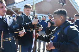 Burn survivors mingle with the 3d U.S. Infantry Regiment Drill Team