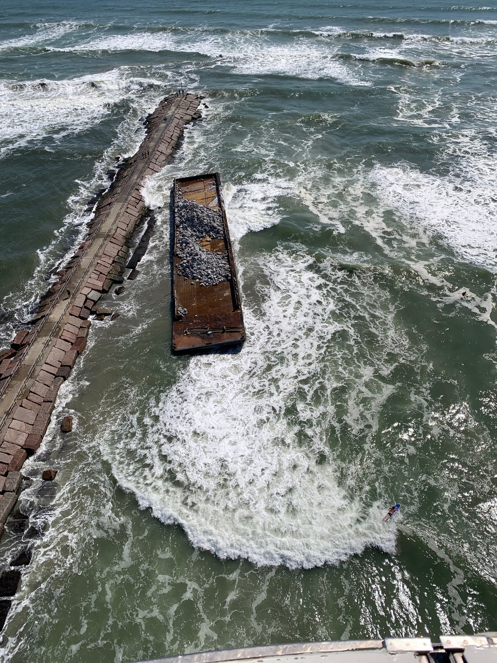 Coast Guard responds to adrift, aground barge near Corpus Christi, Texas