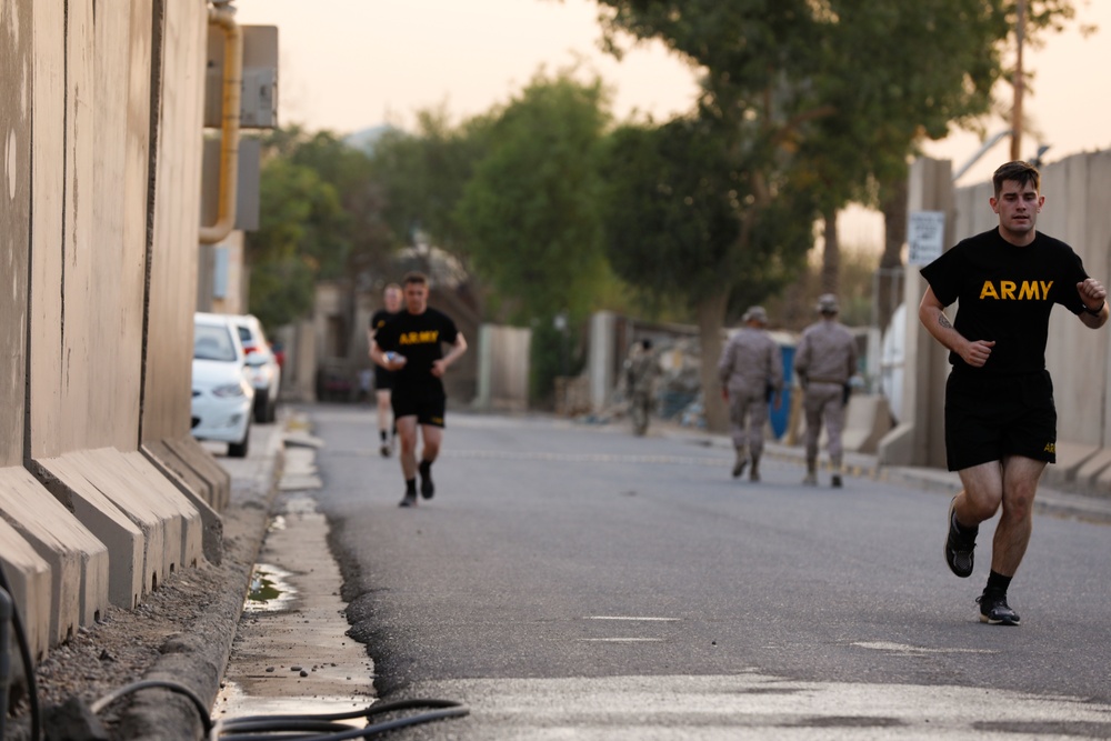 Combined Joint Task Force Operation Inherent Resolve participate in the SSG Ollis CrossFit Challenge